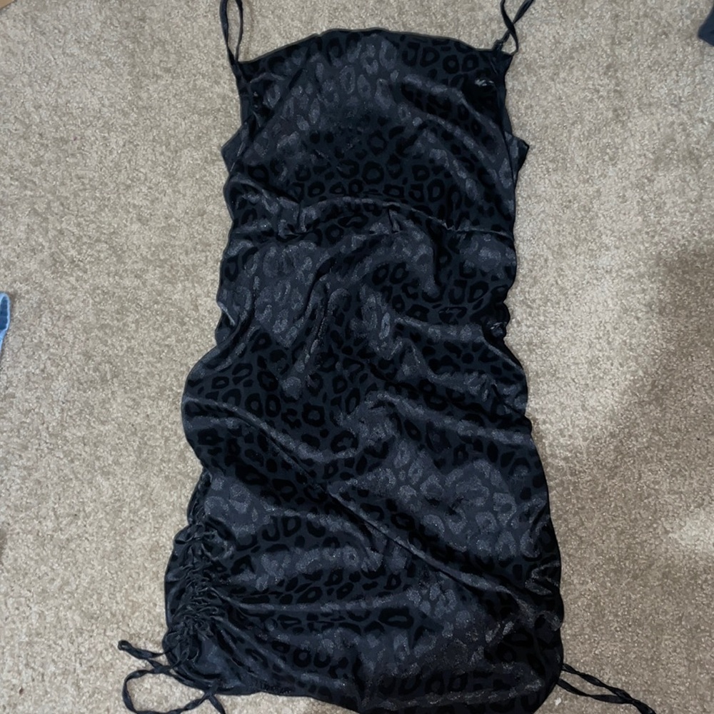 Black, leopard spotted dress.